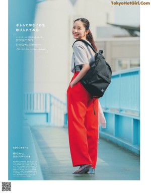 A magazine spread with a woman wearing a straw hat.