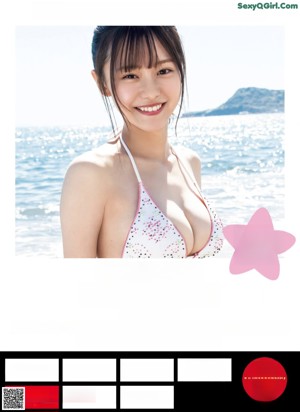 A woman in a white bikini standing on a beach.