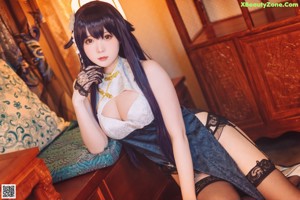 A woman in lingerie posing for a picture. 